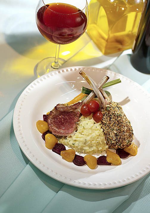 Lamb chops with risotto and a glass of red wine