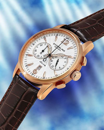 Rose-gold chronograph wristwatch with a brown leather strap